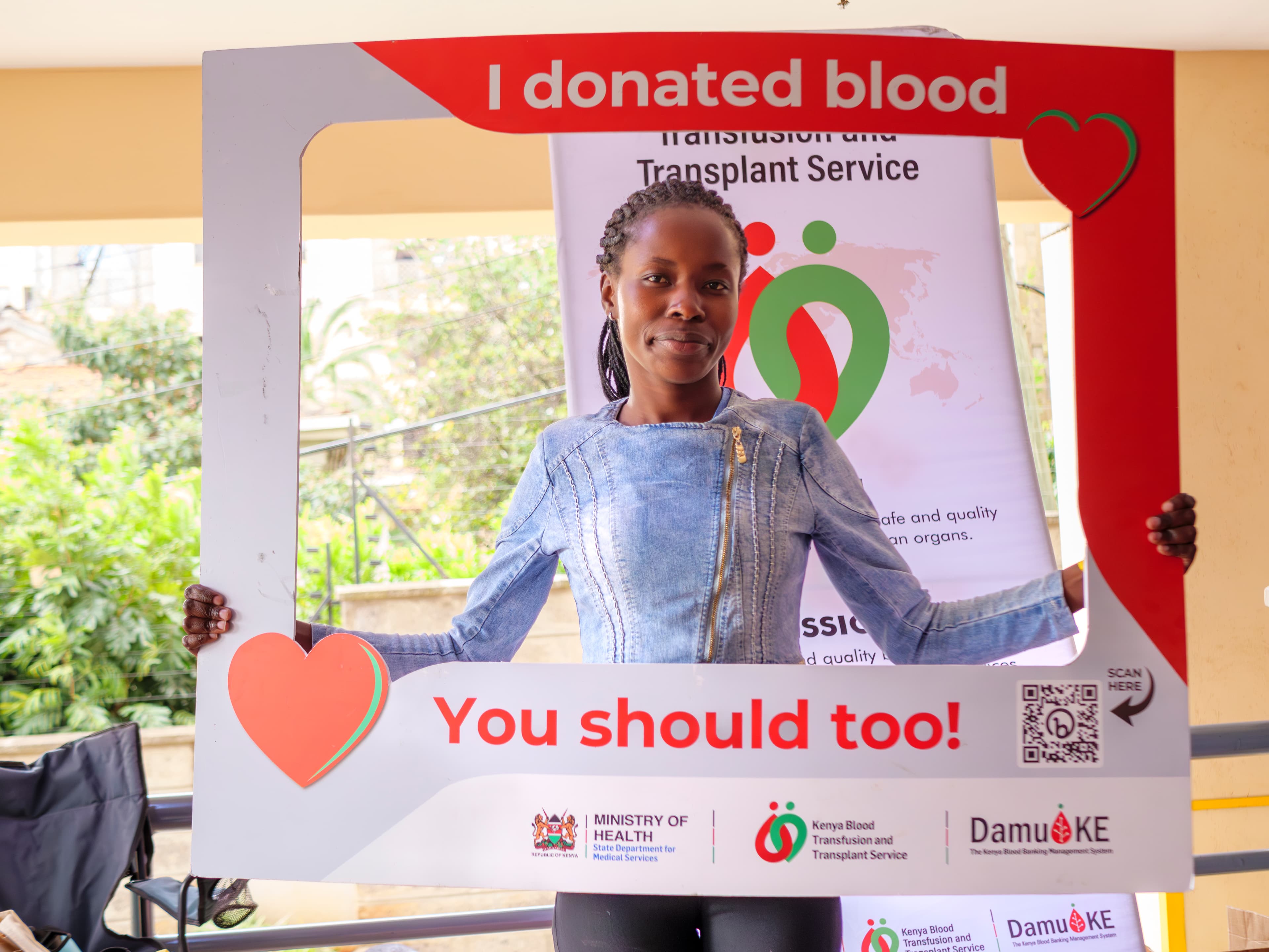 Smiling blood transfusion recipient